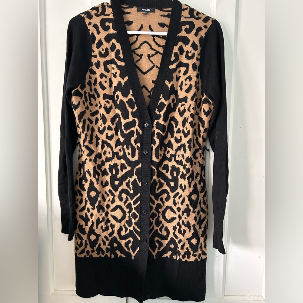 Ladies animal print long cardigan. Button front.